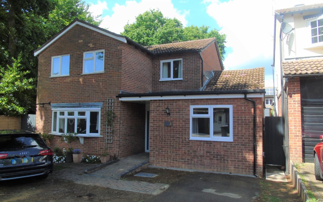 Single storey front extension and conversion of existing garage in Whitehall, Bordon